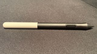 The Wacom One stylus on a desk