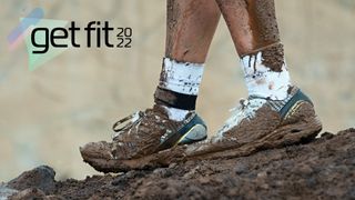 Man wearing muddy running shoes