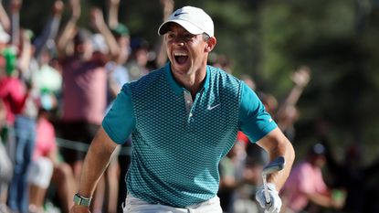 Rory McIlroy celebrates after bunker shot at Augusta National