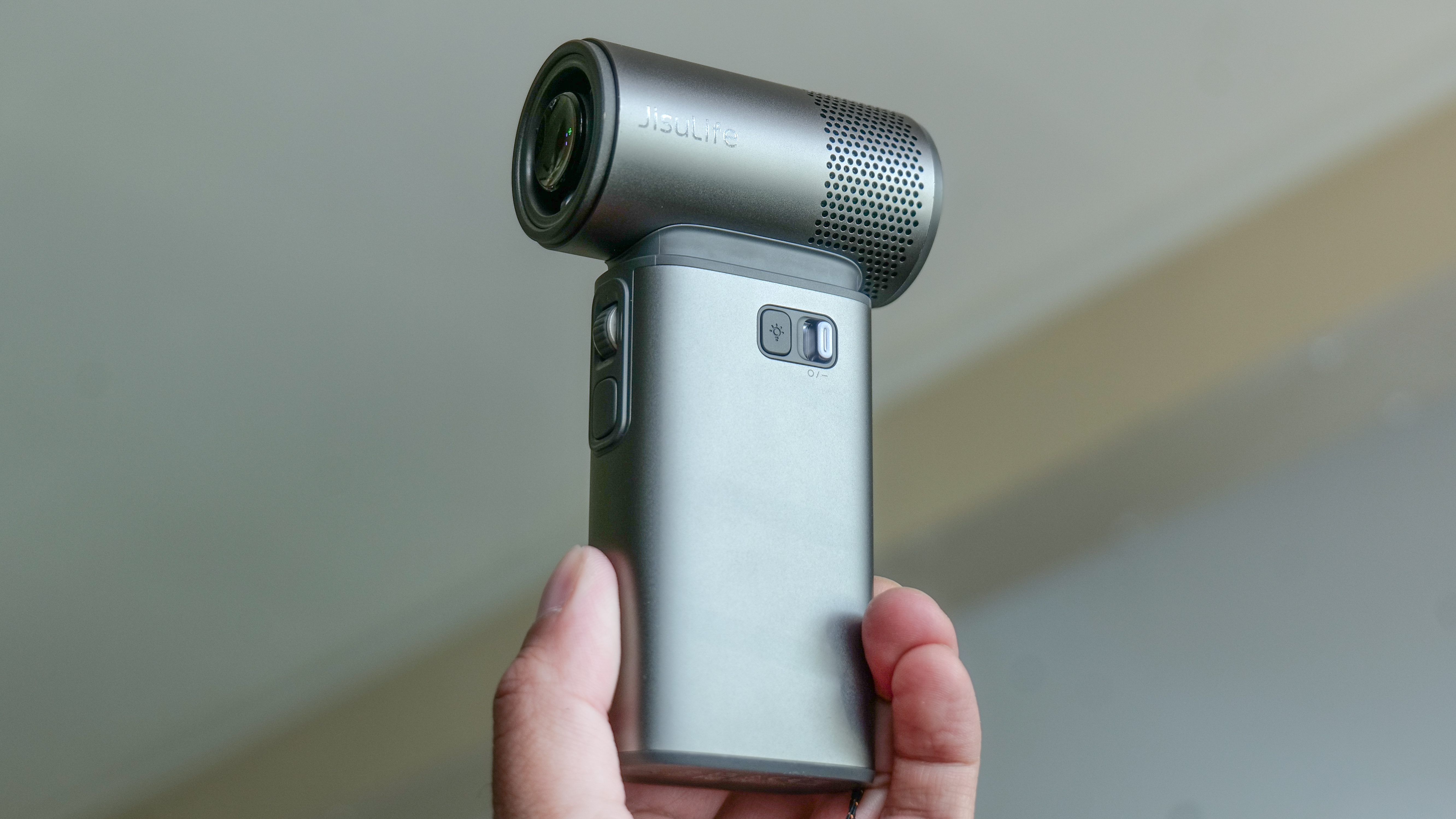 JisuLife Handheld Fan Ultra2 being used to beat the heatwave.