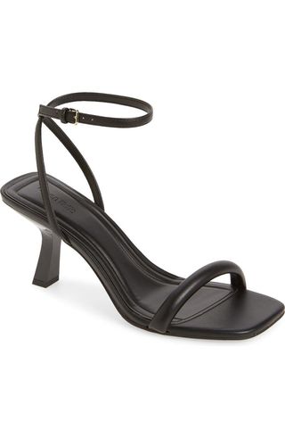 black heeled sandals with an ankle strap