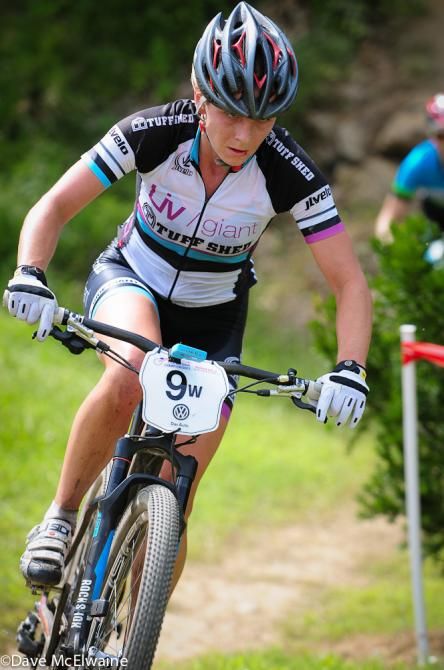 Amy Beisel; (Liv Giant) at the end of lap four