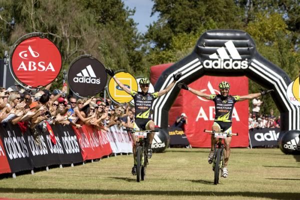 Rudi van Houts and Jose Hermida of team Multivan Merida 2 celebrate the stage win during the final stage (stage eight) of the 2010 Absa Cape Epic Mountain Bike stage race held between Oak Valley and Lourensford in the Western Cape, South Africa.