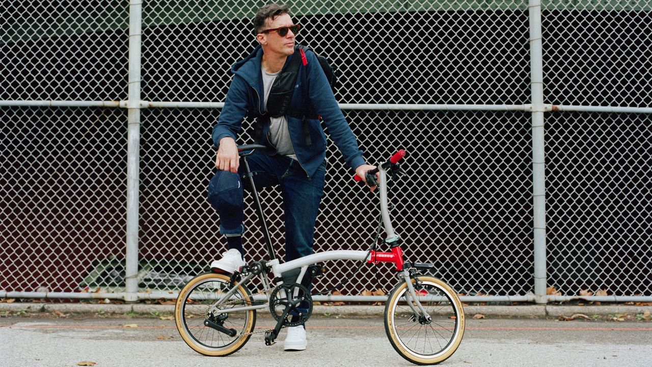 Image shows David Millar with a Brompton CHPT3 v4 in New York City