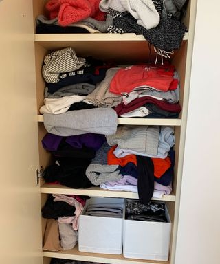 Clothes arranged on shelves