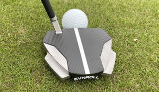 Evnroll ER11vx Putter resting on the golf course showing off its large club head and footprint