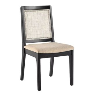 A black upholstered rattan dining chair