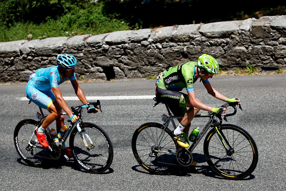 Daniel Martin (Cannondale-Garmin) rides ahead of Andriy Gribko (Astana) during stage 11 of the 2015 Tour de France.