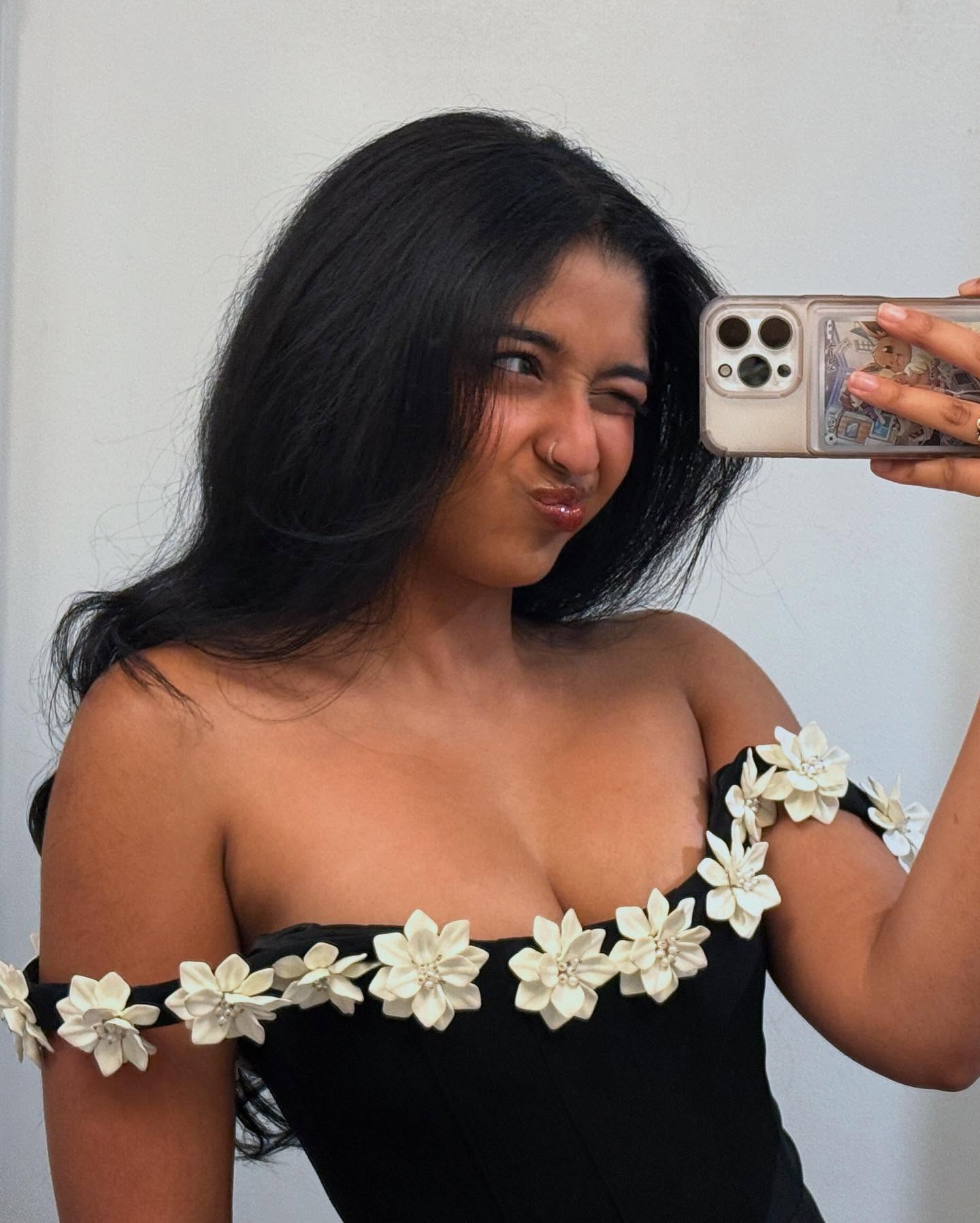 Maitreyi Ramakrishnan taking a mirror selfie.