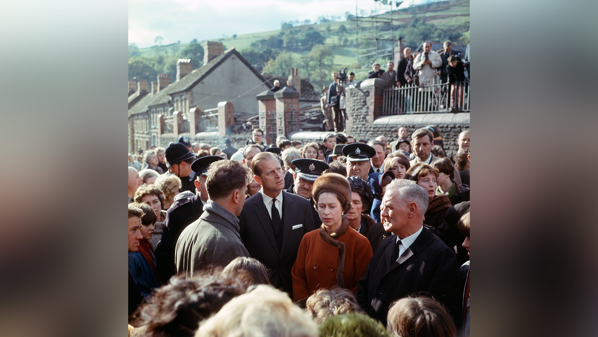 Queen Elizabeth II and Charles among crowd at Aberfan.