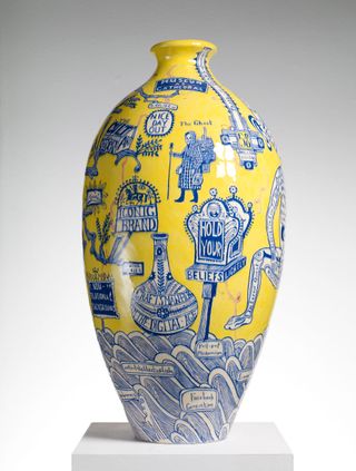 yellow vase with blue print