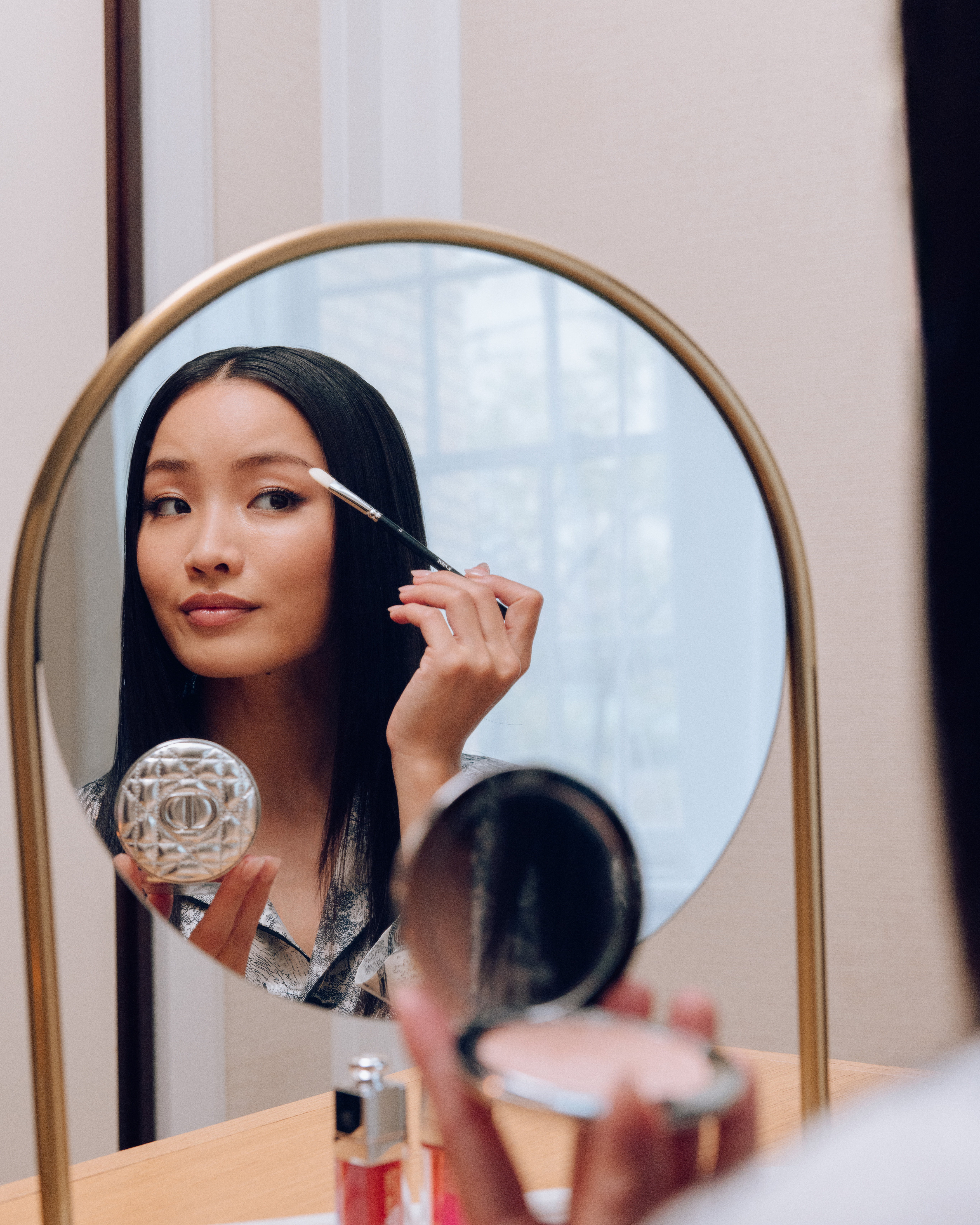 Anna Sawai getting ready for the 2025 Met Gala wearing Dior and Cartier