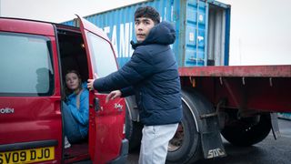 Astrid hiding in a van with Nathan shutting the door in Shetland season 9 episode 4