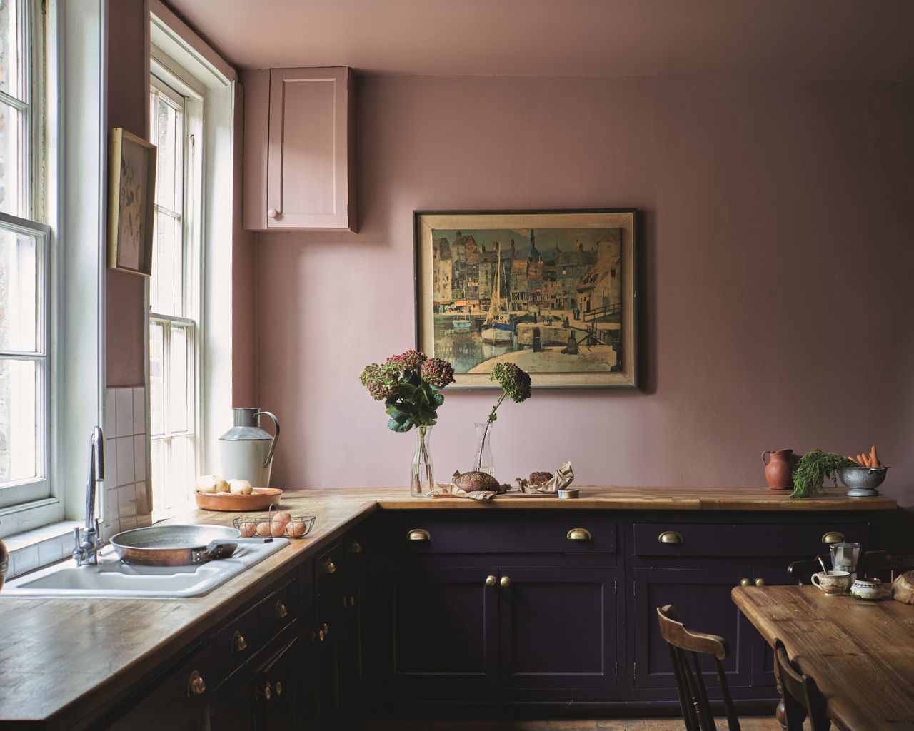 dark kitchen with pink painted walls