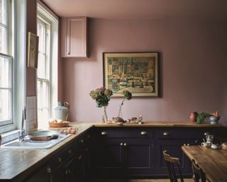 dark kitchen with pink painted walls