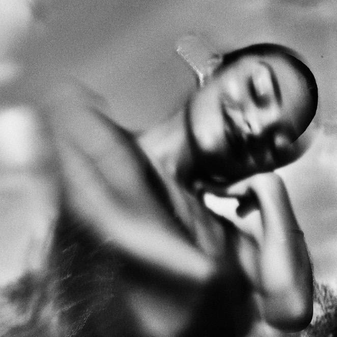 olivia dean smiling in a blurred black and white photo for the cover art of her album the art of loving