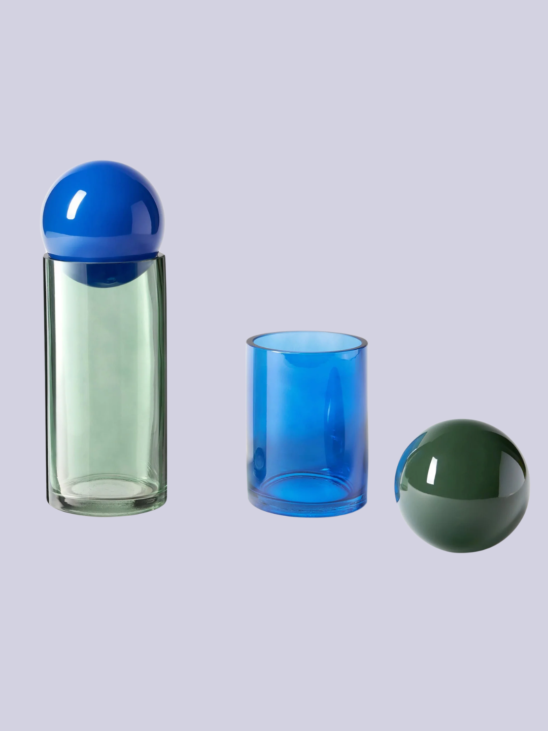 A pair of blue and green storage bottles from Westwing