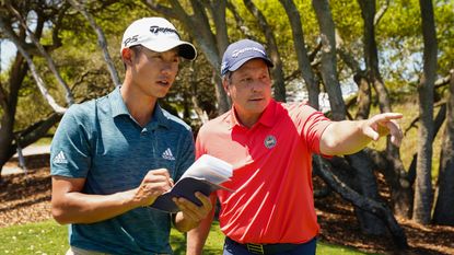 Collin Morikawa and PGA Coach, Rick Sessinghaus during the 2021 PGA Championship Media Day at the Ocean Course on April 12, 2021 in Kiawah Island, South Carolina