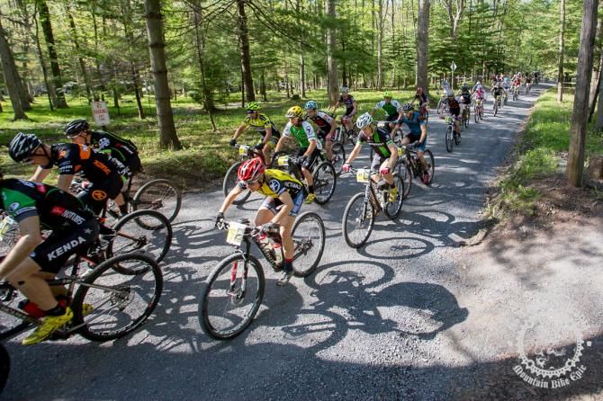 Cheryl Sornson in the peloton leading out on the crushed gravel towards the singletrack