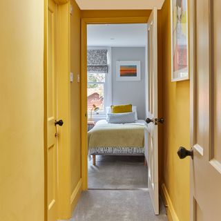 yellow painted corridor