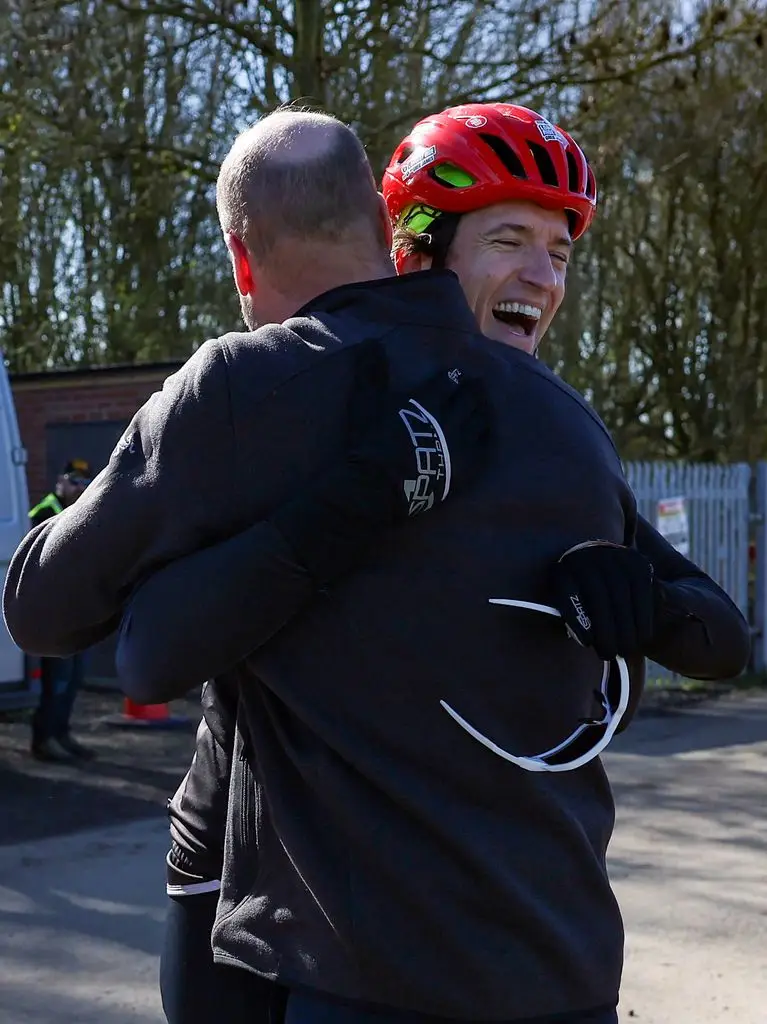 Prince WIlliam hugging Greg James