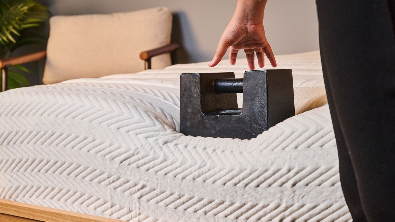 An edge support test is conducted on the Leesa Legend Hybrid Mattress