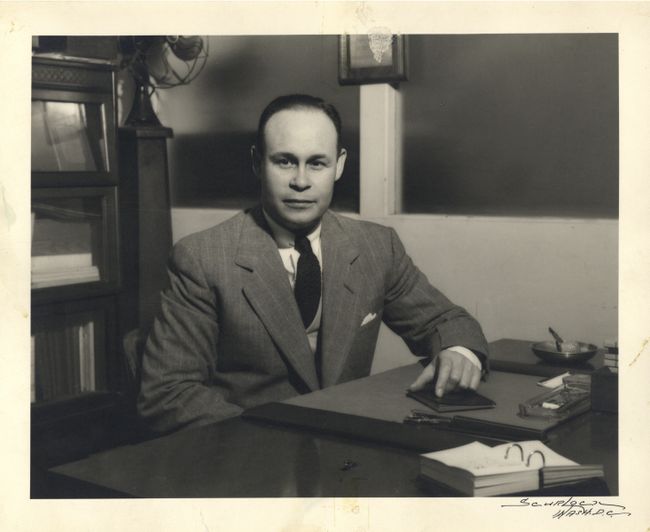 Dr. Charles Drew sitting at his desk