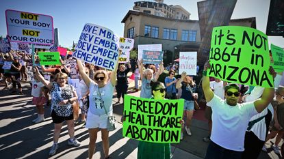 Abortion rights rally in Arizona with hand-drawn signs