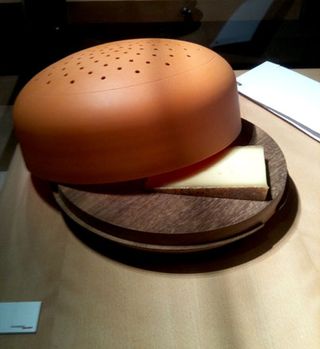 Cheese board with brown dome lid