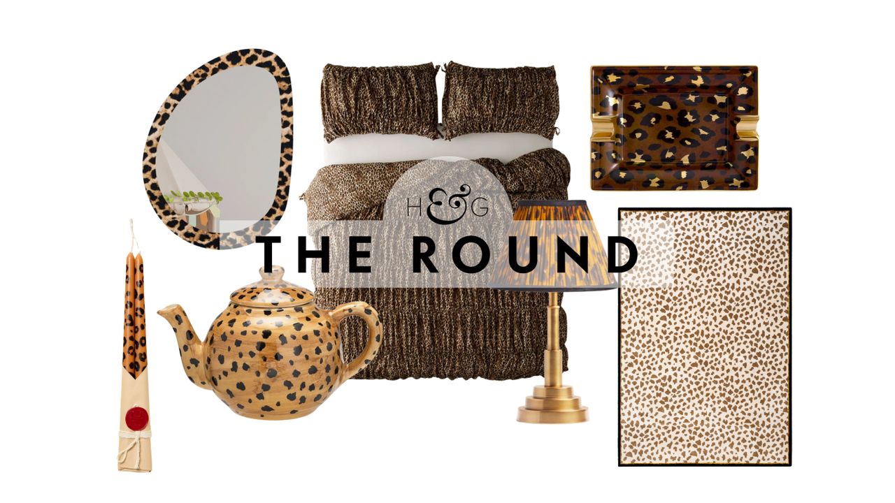 Leopard print decor, including an irregular wall mirror, taper candle duo, tea kettle, table runner, duvet set, ash tray, table lamp, and rug, pictured against a white background