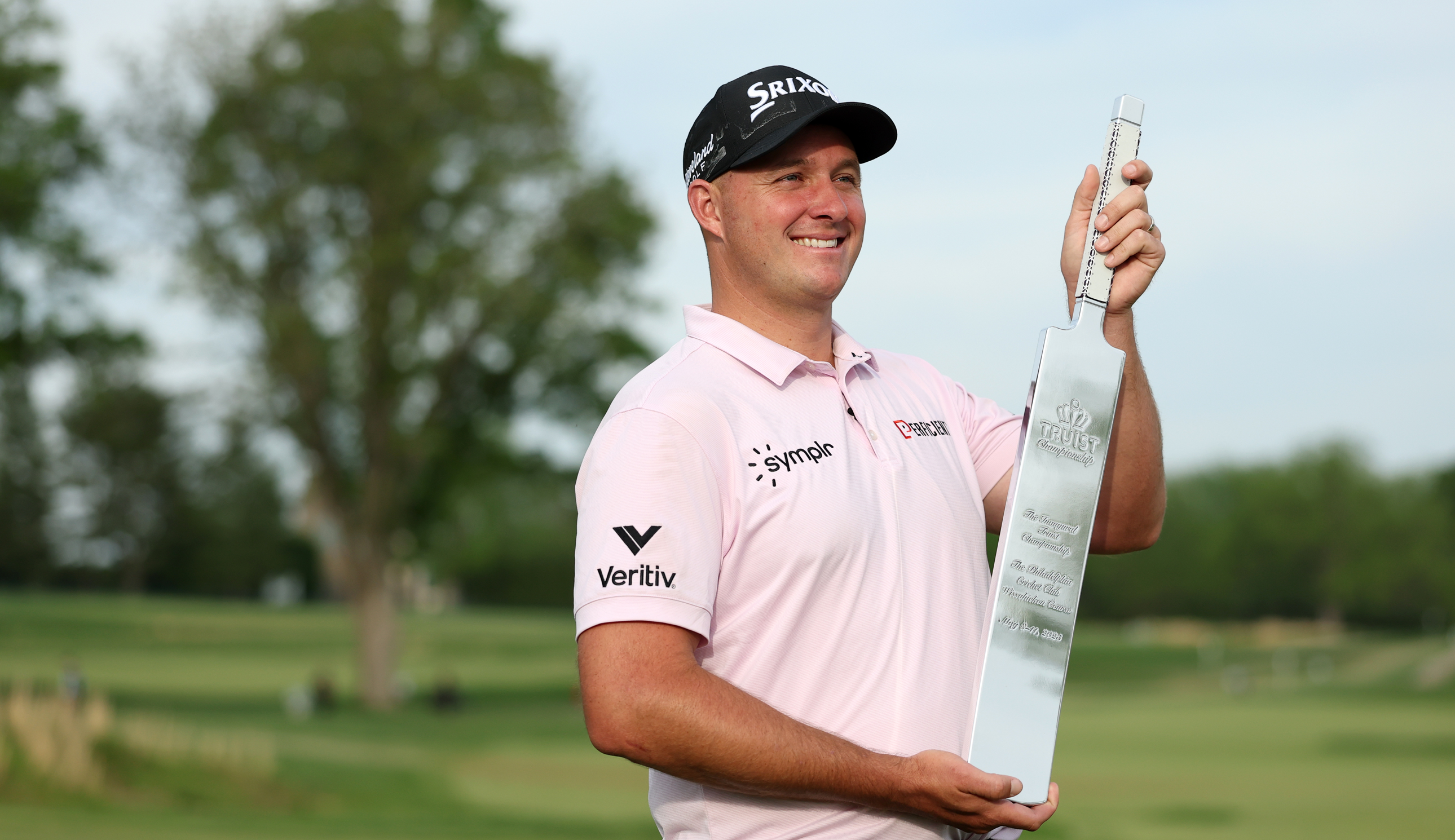 Sepp Straka holds the Truist Championship trophy