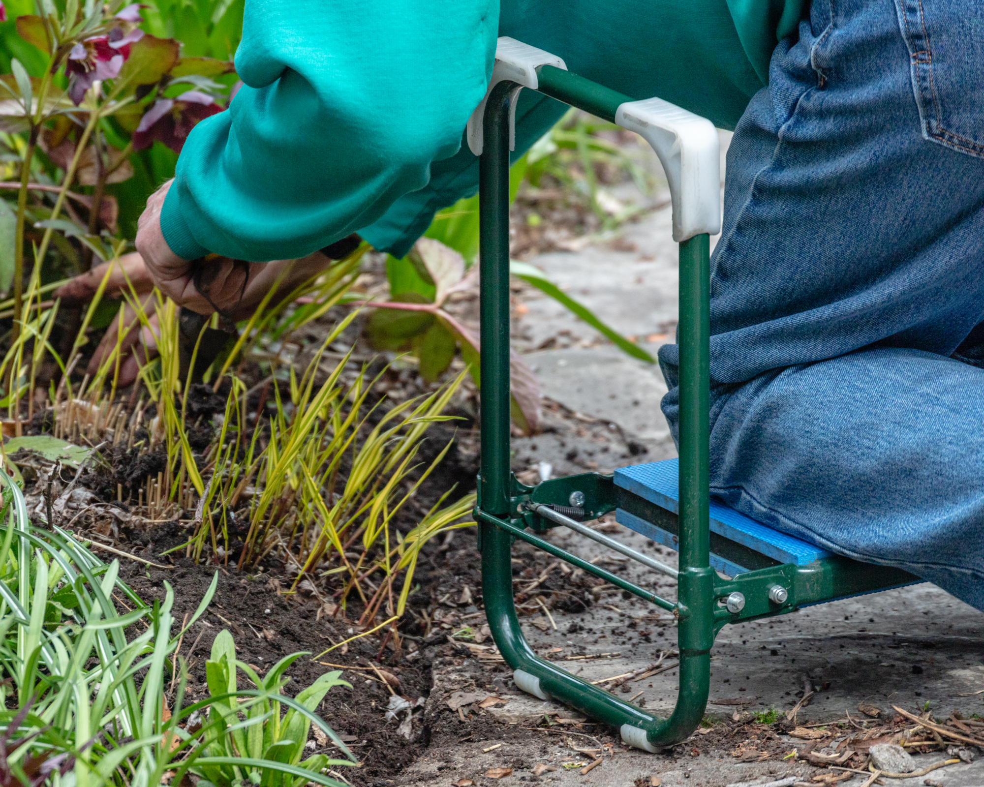 gardener working from kneeler with seat