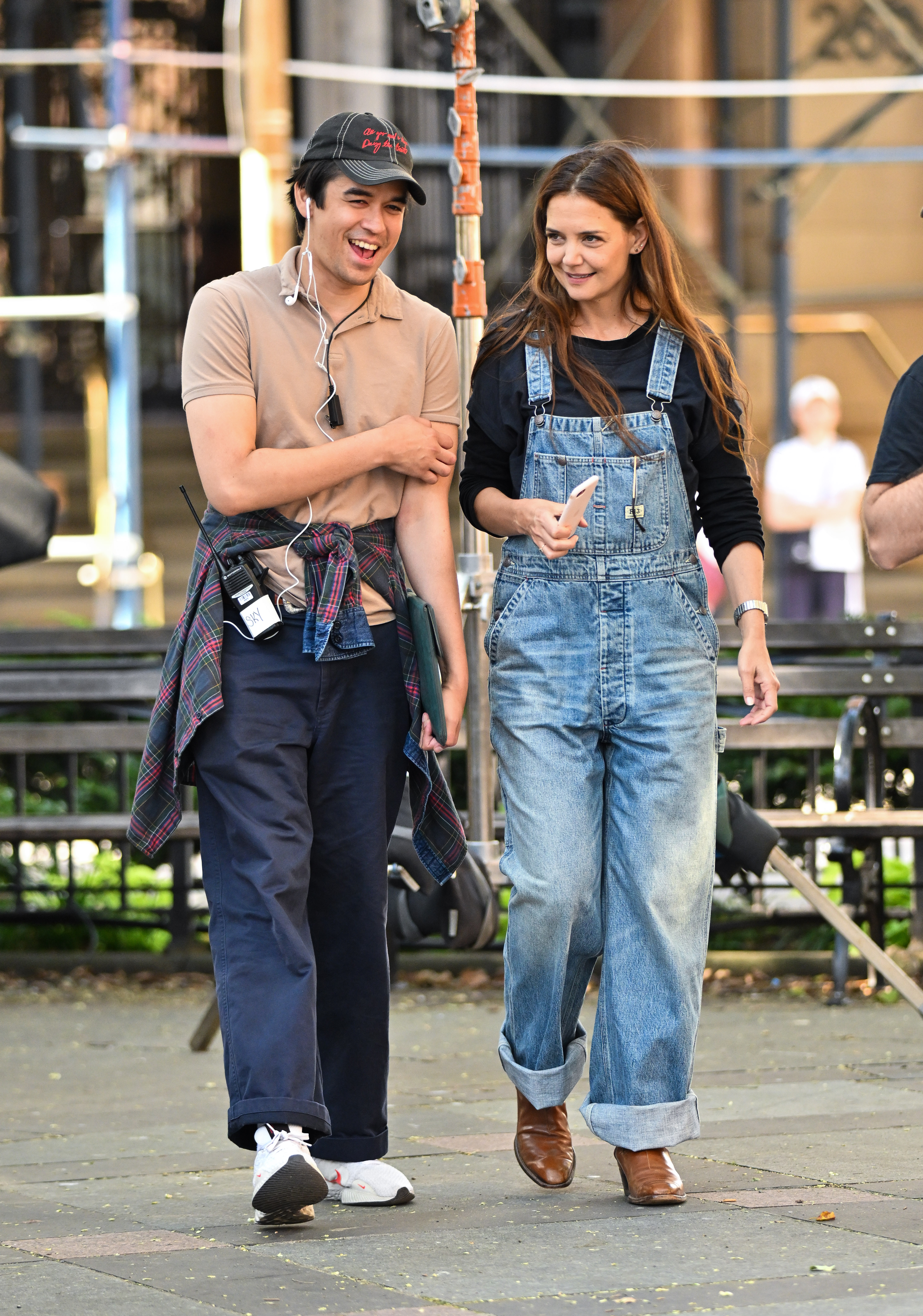 Katie Holmes styled denim overalls and cowboy boots on the set of 'Happy Hours'