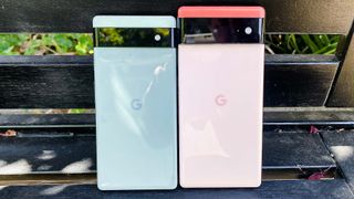 Google Pixel 6a and 6 side by side on a bench