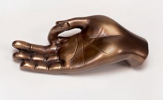 Metal hand by Sunil Sethi Design Alliance