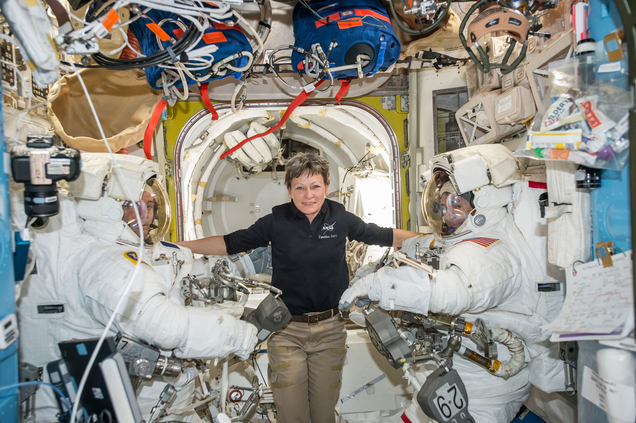 NASA astronaut Peggy Whitson (center) poses with crewmates Shane Kimbrough of NASA (right) and Thomas Pesquet of the European Space Agency ahead of a Jan. 13, 2017 spacewalk outside the International Space Station. Kimbrough and Pesquet are taking another