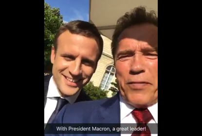 Former governor of California (and Terminator star) Arnold Schwarzenegger and new French President Emmanuel Macron