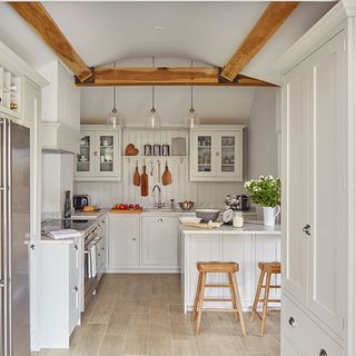 white kitchen with worktop and cabinets