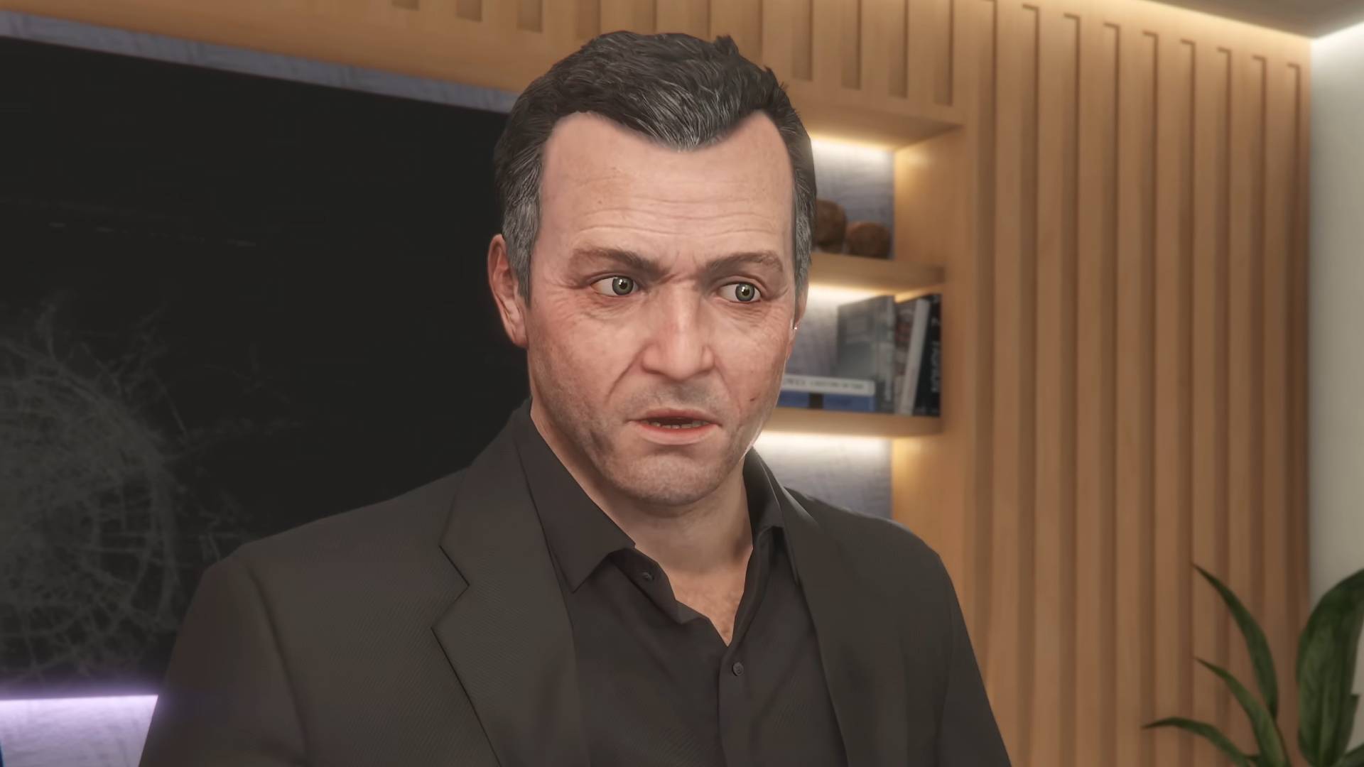 GTA Online: A Safehouse in the Hills trailer screenshot shows a surprised Michael De Santa.