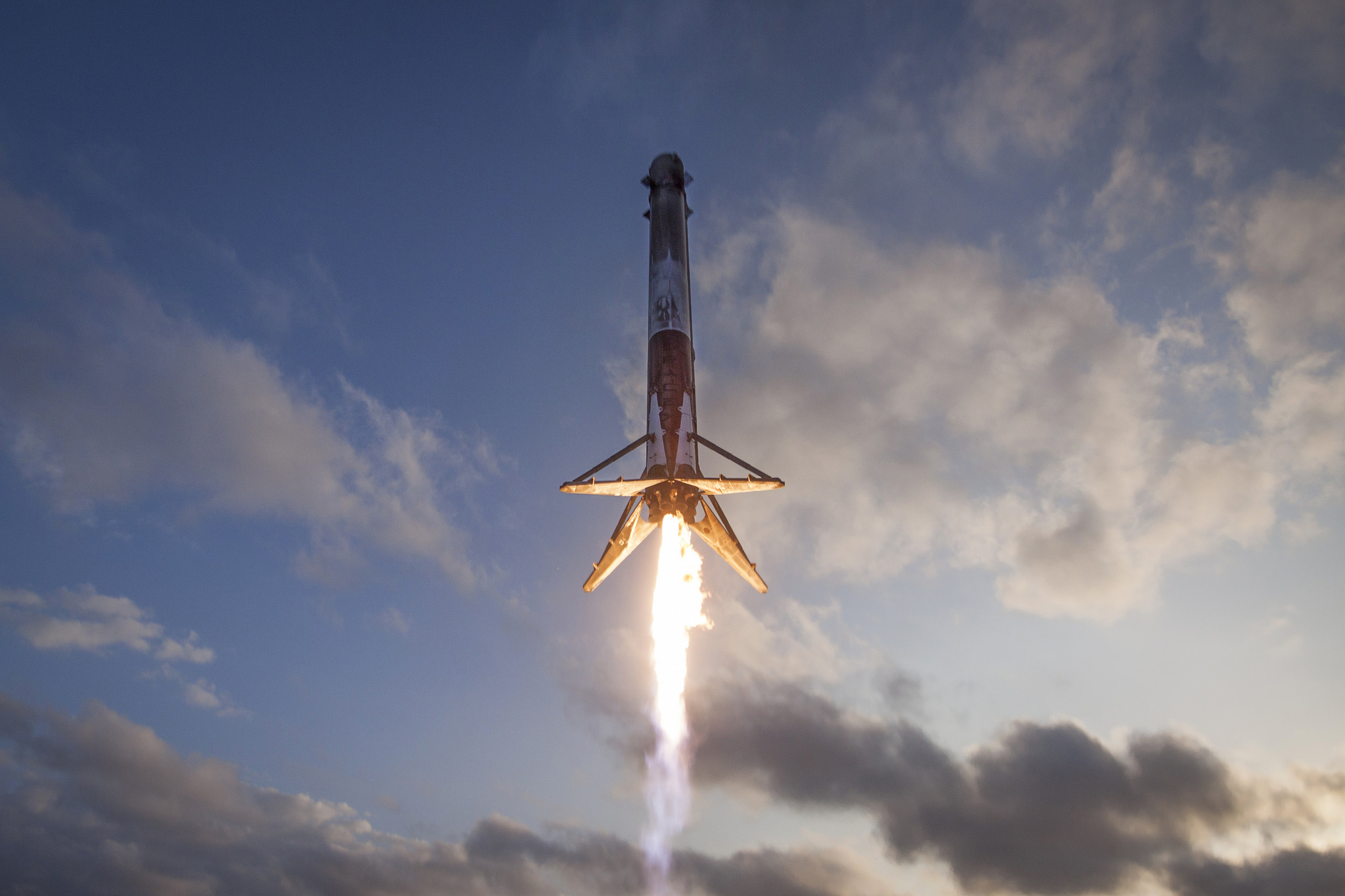 A SpaceX Falcon 9 rocket booster comes in for a drone ship landing on March 30, 2017 after launching the SES-10 communications satellite into space. It was the first time SpaceX ever reused a Falcon 9 booster.