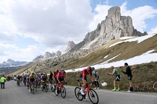 TRE CIME DI LAVAREDO ITALY MAY 26 LR Geraint Thomas of The United Kingdom Pink Leader Jersey and Laurens De Plus of Belgium and Team INEOS Grenadiers lead the peloton at the Passo Giau 2236m during the 106th Giro dItalia 2023 Stage 19 a 183km stage from Longarone to Tre Cime di Lavaredo 2307m UCIWT on May 26 2023 in Tre Cime di Lavaredo Italy Photo by Tim de WaeleGetty Images