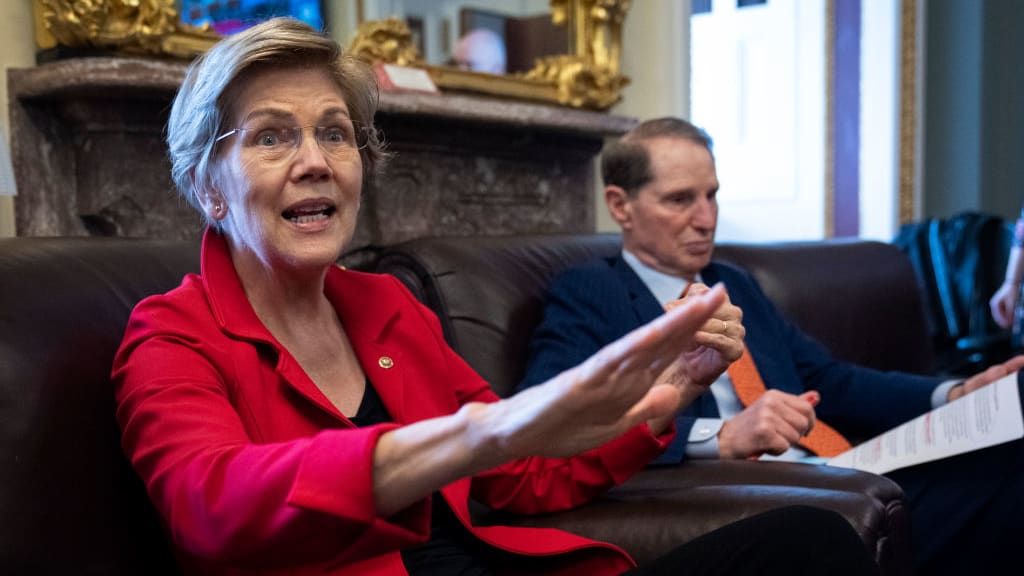 Sen. Elizabeth Warren and Sen. Ron Wyden.