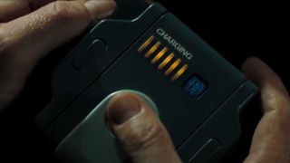 The portable defibrillator device, held up close, in Casino Royale.