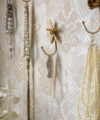 Jewelry on wall hooks