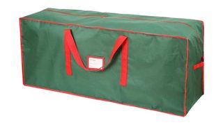 A green 6ft Christmas Tree storage bag with red handles and a card slot, for the best Christmas tree storage bags.