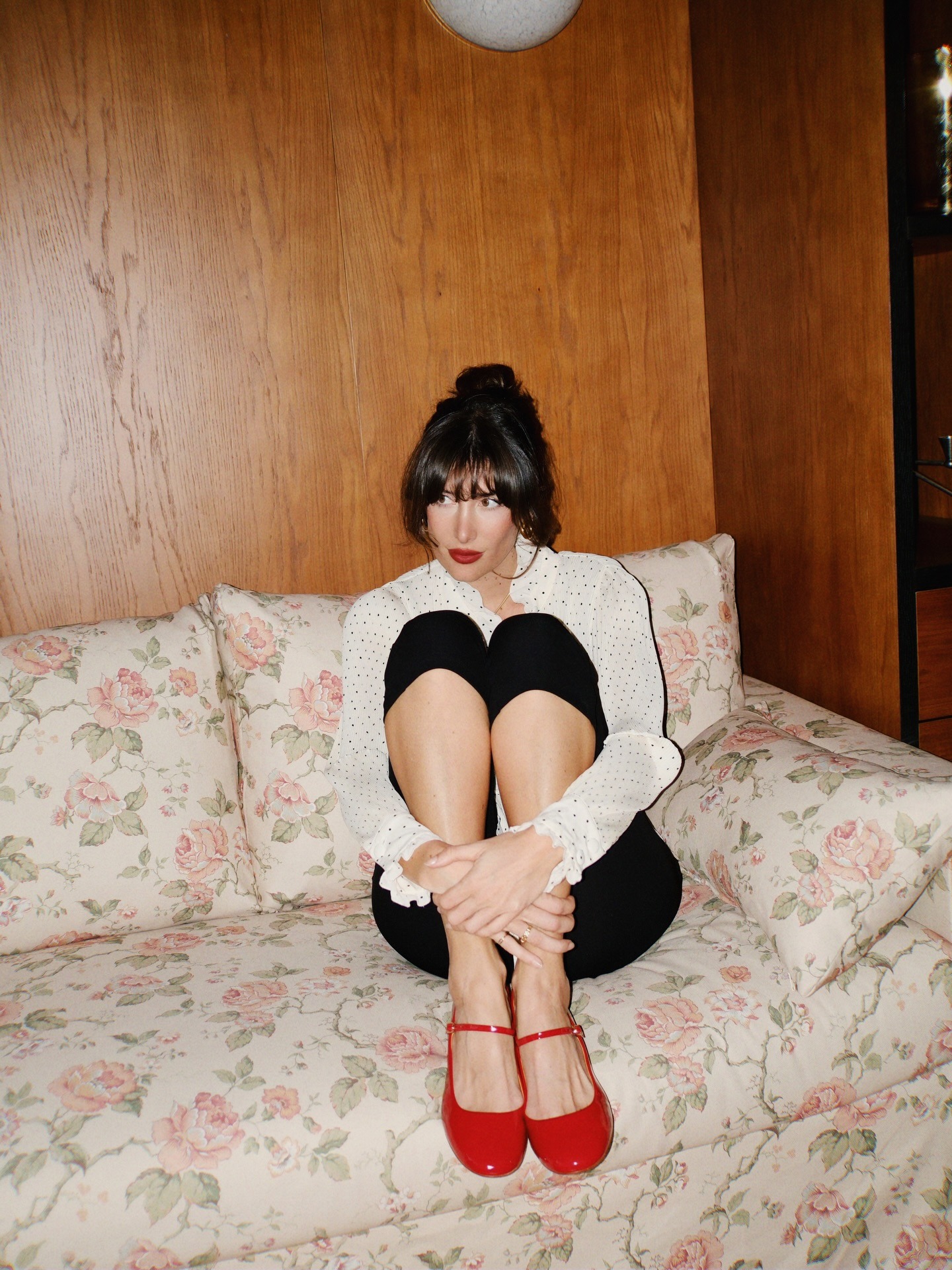 @juliesfi wearing red Mary Janes, capris, and a white button down