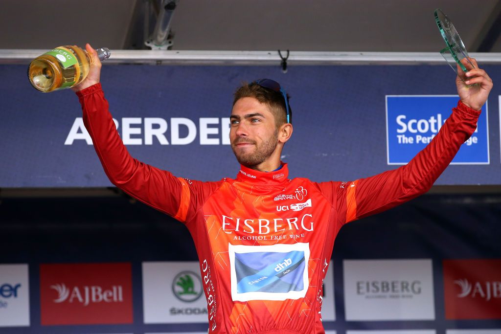 ABERDEEN SCOTLAND SEPTEMBER 12 Jacob Scott of United Kingdom and Team Canyon DHB Sungod celebrates winning the red sprint jersey on the podium ceremony after the 17th Tour of Britain 2021 Stage 8 a 173km stage from Stonehaven to Aberdeen TourofBritain TourofBritain on September 12 2021 in Aberdeen Scotland Photo by Alex LiveseyGetty Images