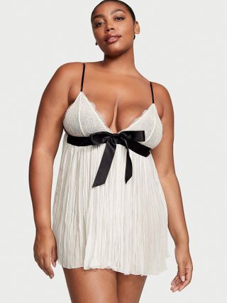 Victoria's Secret white babydoll dress with a black bow