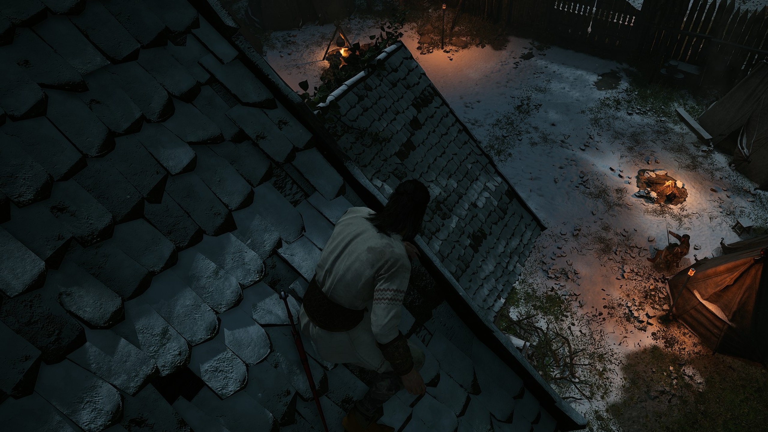 The Blood of Dawnwalker gameplay showing Coen hiding on a rooftop as guards camp below