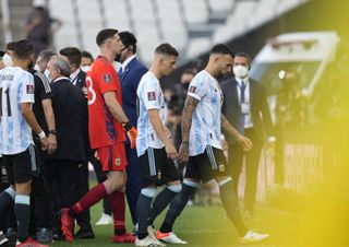 Argentina players walk off the pitch